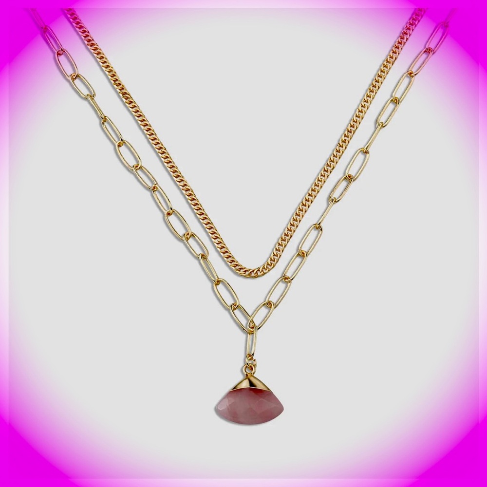 Rose Quartz pendant on a gold plated stainless steel necklace.